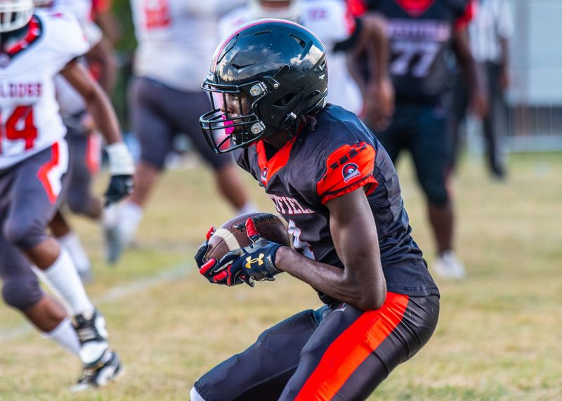 Redford Westfield Prep's Damauri Suber rushes during a Charter School Conference football game on Thursday, Sept. 18, 2025, at Detroit Leadership Academy.