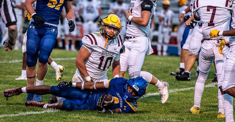 Riverview's Braylon Orcher brings down Drake Jones during a 39-8 Jefferson victory on Friday, Sept. 19, 2025.
