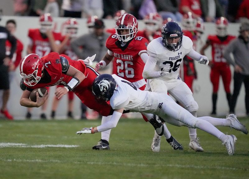 Port Huron quarterback Joey Gilbert (7) lunges forward on a carry during a game against Fraser at Memorial Stadium in Port Huron on Friday, Sept. 19, 2025.