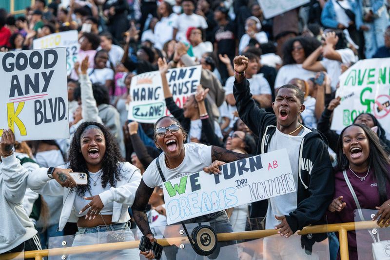 Fans cheer during the rivalry game between Detroit Cass Tech and Detroit King at Tom Adams Field at Wayne State University in Detroit on Friday, Sept. 19, 2025.