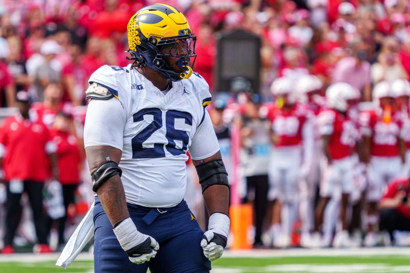 Michigan Wolverines defensive lineman Rayshaun Benny reacts after a sack against the Nebraska Cornhuskers during the second quarter at Memorial Stadium, Saturday, Sept. 20, 2025.