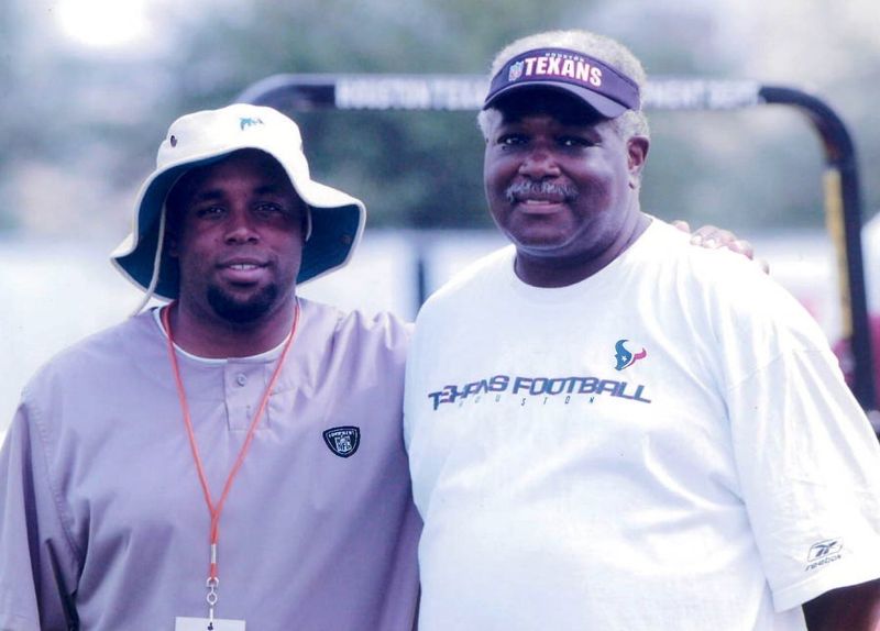 Miami Dolphins GM Chris Grier (left) and his father, long-time NFL executive Bobby Grier. Photo via Miami Dolphins.