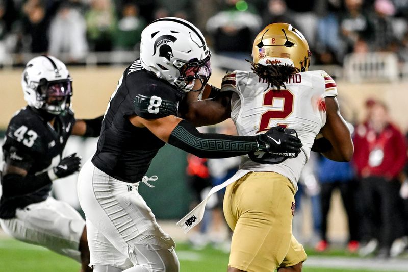 Michigan State's Evan Boyd WR Aisea Moa, left, tackles Boston College's urbo Richard during the third quarter on Saturday, Sept. 6, 2025, at Spartan Stadium in East Lansing.