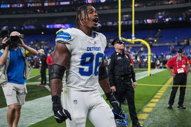 Detroit Lions defensive end Al-Quadin Muhammad (96) shouts “Let’s Go” as he exits the field after 38-30 win over Baltimore Ravens at M&T Bank Stadium in Baltimore, Md. on Monday, Sept. 22, 2025.