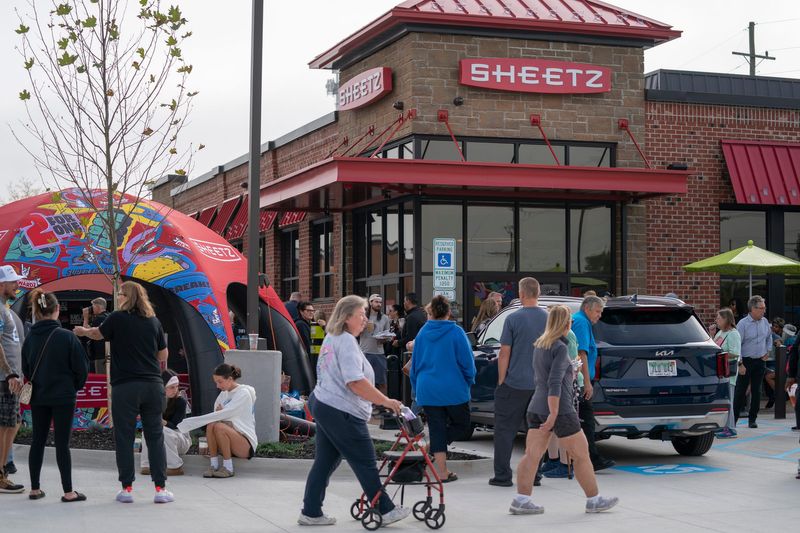 People at the Sheetz grand opening in Chesterfield Township on 23 Mile Road on Tuesday, Sept. 23, 2025.