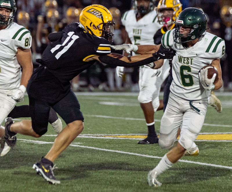 The Zeeland East football team hosts Zeeland West in the bird bowl on Sept. 26.