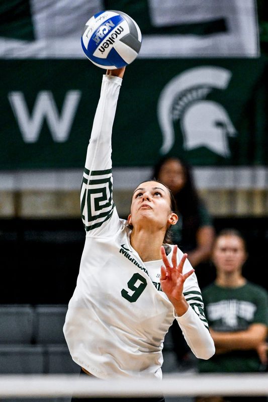Michigan State's Zuzanna Kulig serves the ball to Loyola during the second set in the volleyball game on Sunday, Sept. 8, 2024, at the Breslin Center in East Lansing.