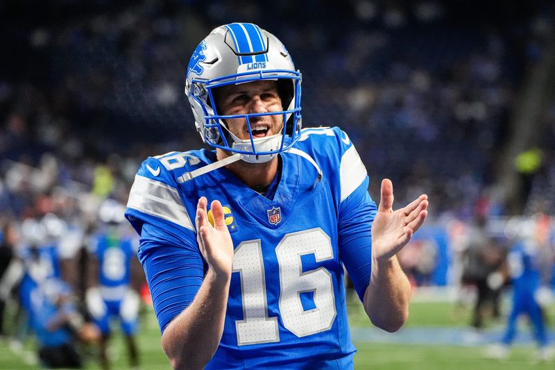 Detroit Lions quarterback Jared Goff (16) cheers for teammates during warm up ahead of the Cleveland Browns game at Ford Field in Detroit on Sunday, Sept. 28, 2025.