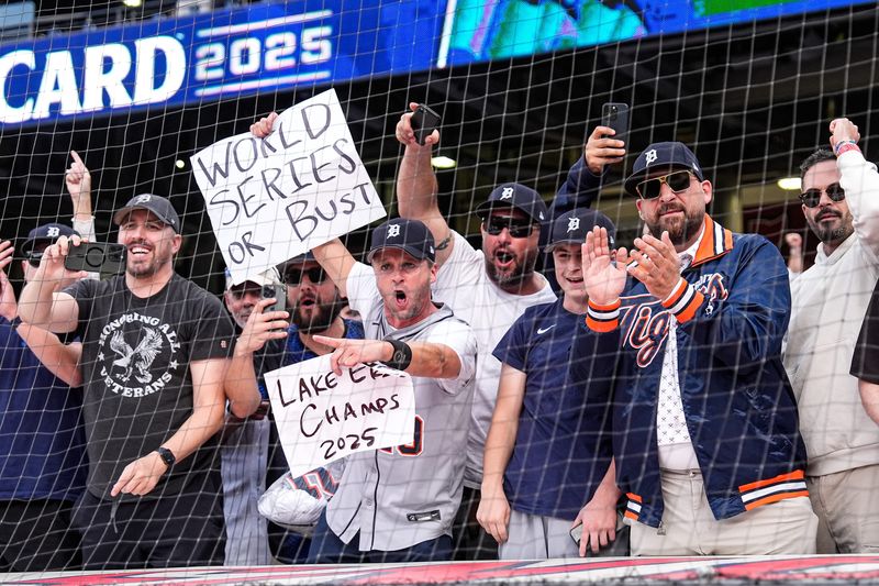 Detroit Tigers fans cheer on the team after 6-3 win over Cleveland Guardians in Game 3 of AL wild-card series at Progressive Field in Cleveland on Thursday, Oct. 2, 2025.