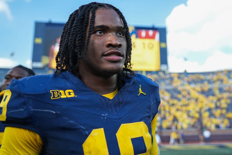 Michigan quarterback Bryce Underwood (19) after defeating Wisconsin at Michigan Stadium in Ann Arbor on Saturday, Oct. 4, 2025.