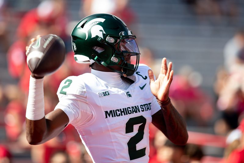Michigan State Spartans quarterback Aidan Chiles (2) warms up before the game against the Nebraska Cornhuskers at Memorial Stadium in Lincoln, Nebraska, on Saturday, Oct. 4, 2025.
