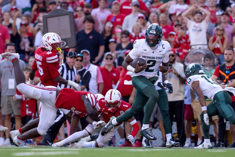 Michigan State Spartans quarterback Aidan Chiles rushes for a touchdown during the game against Nebraska at Memorial Stadium in Lincoln, Nebraska, on Saturday, Oct. 4, 2025.