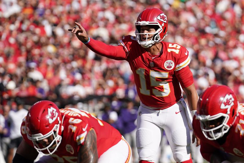 Sep 28, 2025; Kansas City, Missouri, USA; Kansas City Chiefs quarterback Patrick Mahomes (15) calls a play during the second quarter against the Baltimore Ravens at GEHA Field at Arrowhead Stadium.