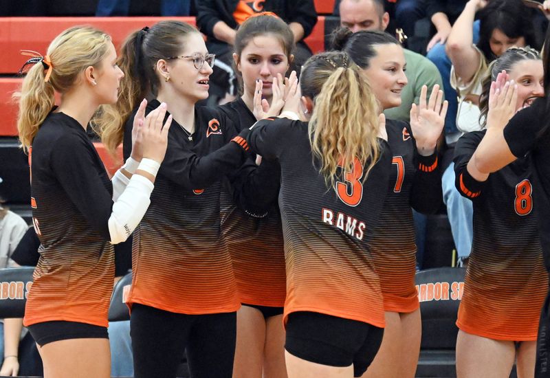 Being part of a high school athletic team for the first time has been an opportunity Harbor Springs senior Carrigan Warner (second from left) wont forget or take for granted.