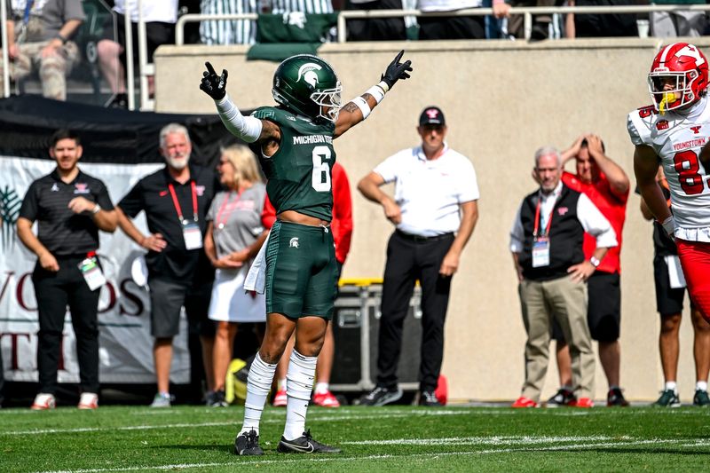 Michigan State's Ade Willie celebrates after breaking up a Youngstown State pass during the first quarter on Saturday, Sept. 13, 2025, at Spartan Stadium in East Lansing.