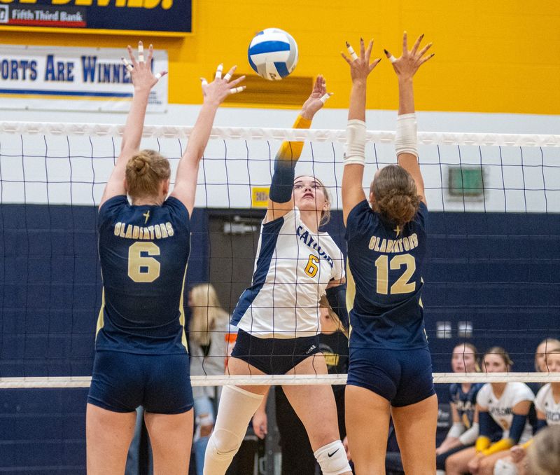 Gaylord volleyball and basketball star Addison McDonald (center) will continue her athletic career at Kirtland Community College,