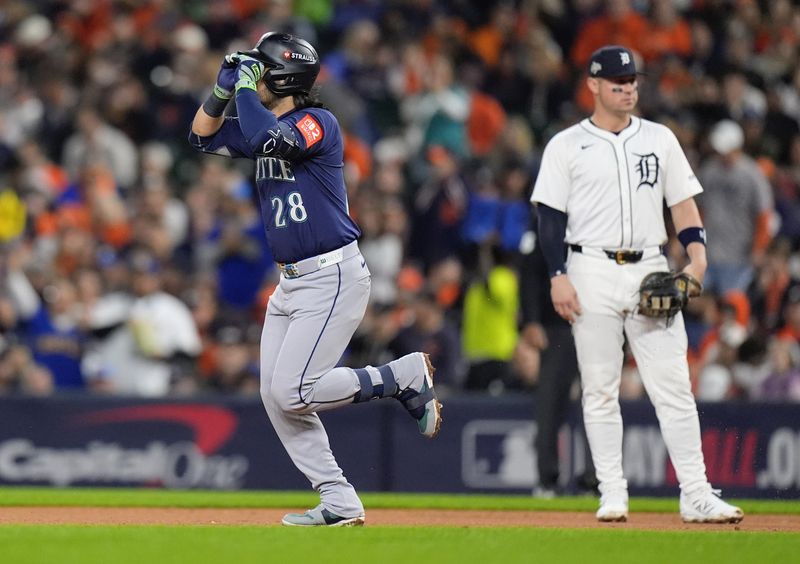 Mariners third baseman Eugenio Suarez celebrates batting a solo home run against Tigers during the fourth inning of ALDS Game 3 at Comerica Park in Detroit on Tuesday, Oct. 7, 2025.