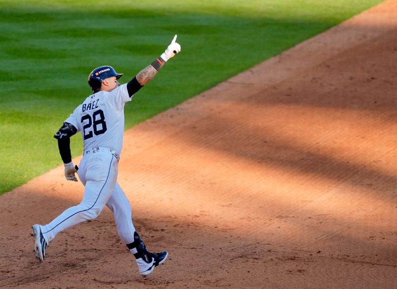 Detroit Tigers Javier Baez runs around the bases after hitting a home run in the sixth inning during game 4 of their game against the Seattle Mariners in the American League Division Series at Comerica Park in Detroit on Wednesday, Oct. 8, 2025.