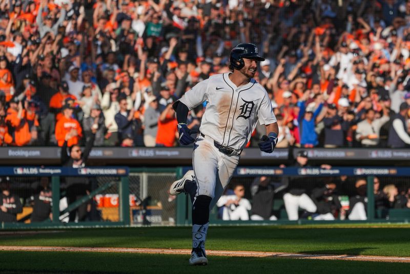 Detroit Tigers third baseman Zach McKinstry (39) runs to first base during ALDS Game 4 at Comerica Park in Detroit on Wednesday, Oct. 8, 2025.