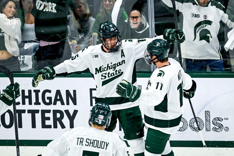 Michigan State's Charlie Stramel, left, celebrates his goal with Owen West during the second period against New Hampshire on Thursday, Oct. 9, 2025, at Munn Ice Arena in East Lansing.