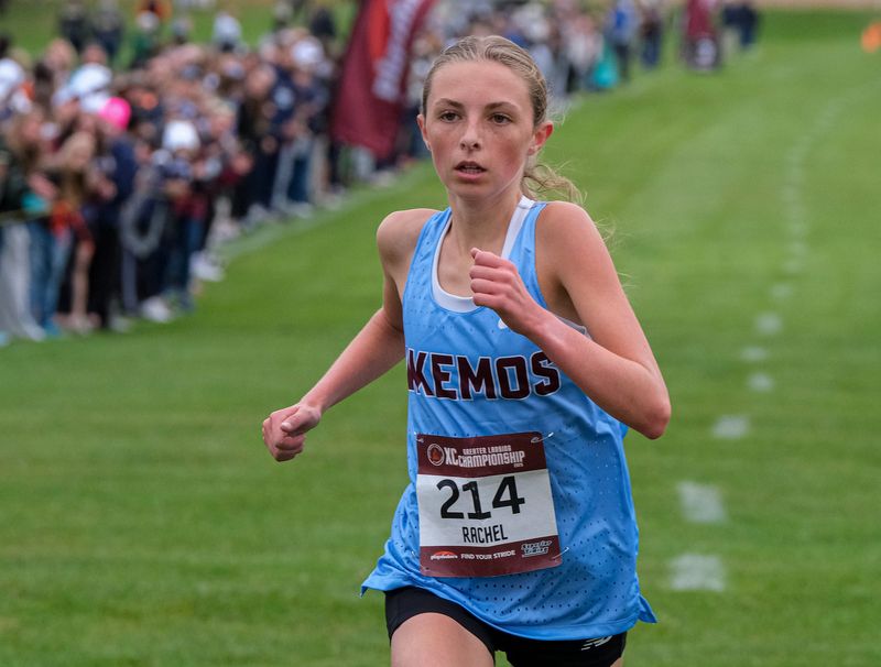 Rachel Smith from Okemos finishes first in the Greater Lansing Girls Cross Country race at Ledge Meadows Saturday, Oct. 11, 2025.