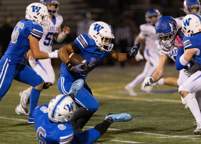 Walled Lake Western's Donovan Triplett during a Lakes Valley Conference football game on Friday, Oct. 10, 2025.