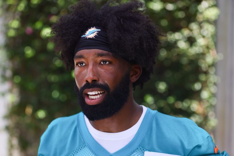 Jun 5, 2024; Miami Gardens, FL, USA; Miami Dolphins cornerback Kendall Fuller (29) speaks to reporters during mandatory minicamp at Baptist Health Training Complex.