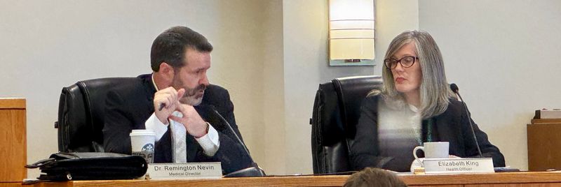 St. Clair County Medical Director Dr. Remington Nevin and Health Officer Elizabeth King discuss fluoride guidelines during the Health Advisory Board meeting on Wednesday, Oct. 15, 2025, in Port Huron.