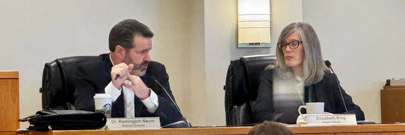 St. Clair County Medical Director Dr. Remington Nevin and Health Officer Elizabeth King discuss fluoride guidelines during the Health Advisory Board meeting on Wednesday, Oct. 15, 2025, in Port Huron.