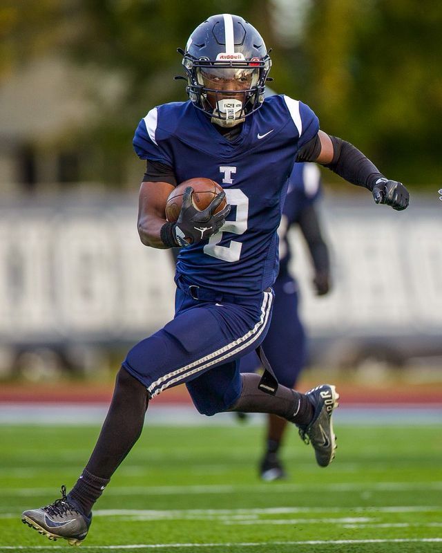 Redford Thurston's Jemir Lynum rushes during a Western Wayne Athletic Conference football game on Friday, Oct. 17, 2025.