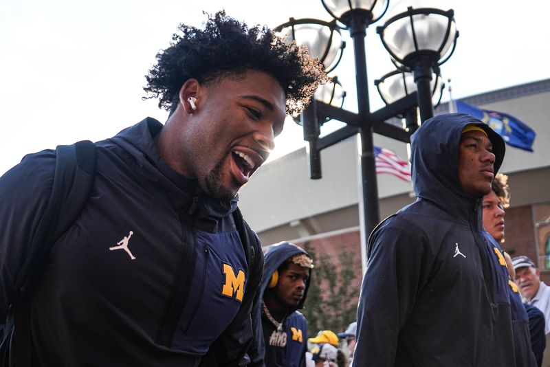 Michigan running back Justice Haynes (22) arrives ahead of the Washington game at Michigan Stadium in Ann Arbor on Saturday, Oct. 18, 2025.