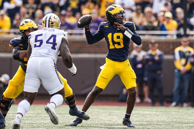 Michigan quarterback Bryce Underwood (19) makes a pass against Washington during the first half at Michigan Stadium in Ann Arbor on Saturday, Oct. 18, 2025.
