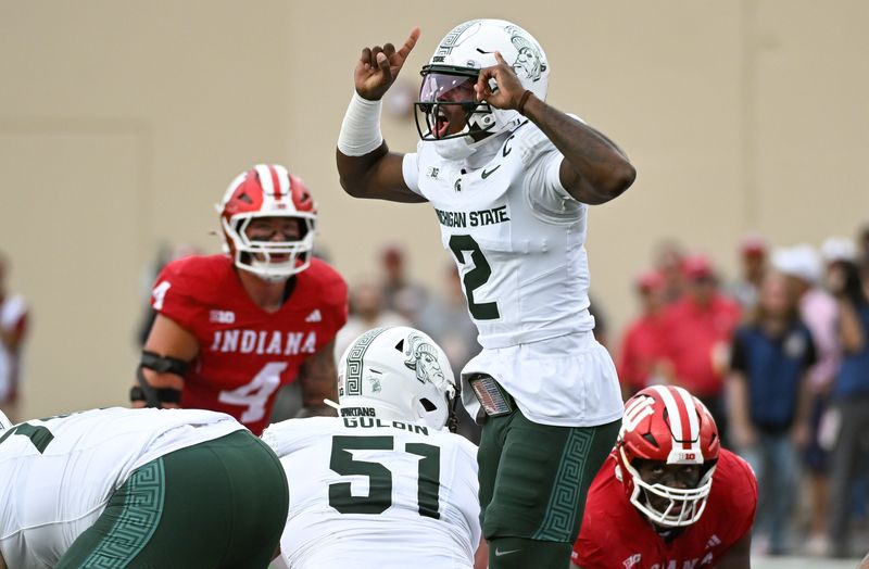 Oct 18, 2025; Bloomington, Indiana, USA; Michigan State Spartans quarterback Aidan Chiles (2) calls a play during the first half against the Indiana Hoosiers at Memorial Stadium. Mandatory Credit: Robert Goddin-Imagn Images