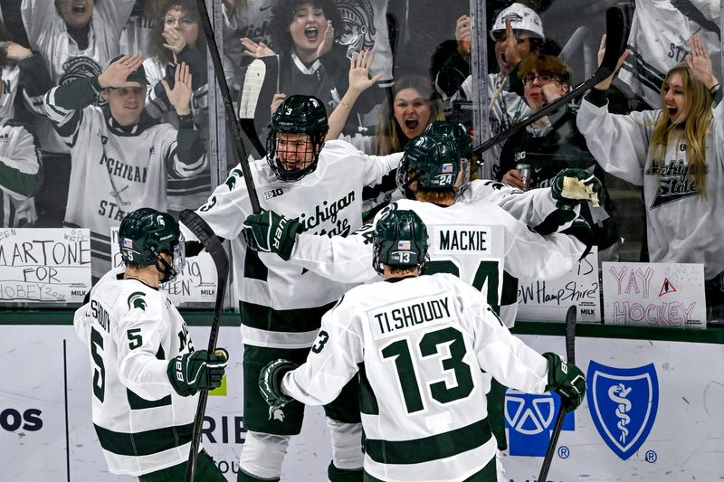 Michigan State celebrates a goal by Tommi Mannisto during the third period in the game against New Hampshire on Thursday, Oct. 9, 2025, at Munn Ice Arena in East Lansing.