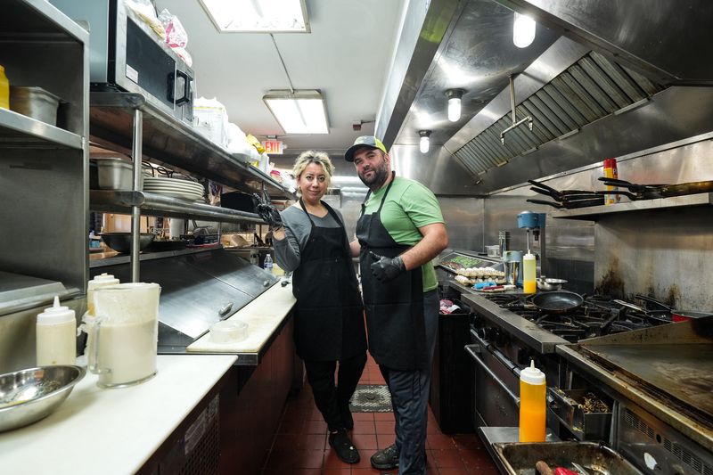 Egla Mio, left, and husband Endrit of Great Lakes Family Restaurant in Eaton Rapids, pictured Monday, Oct. 20, 2025.