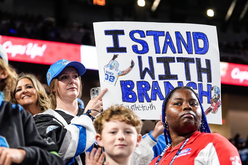 Detroit Lions fans watch warm up ahead of the Tampa Bay Buccaneers game at Ford Field in Detroit on Monday, Oct. 20, 2025.