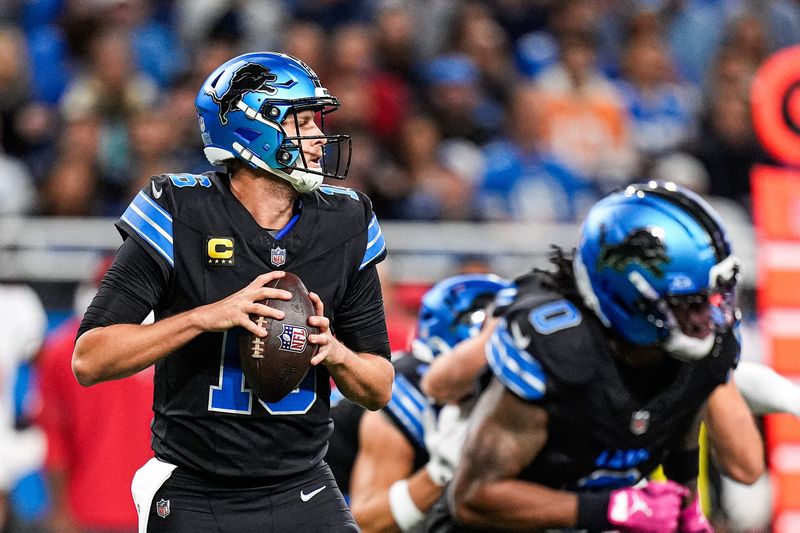 Detroit Lions quarterback Jared Goff (16) looks to pass against Tampa Bay Buccaneers during the first half at Ford Field in Detroit on Monday, Oct. 20, 2025.