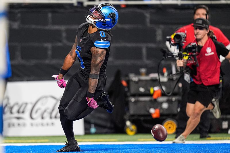 Detroit Lions running back Jahmyr Gibbs (0) runs for a touchdown against Tampa Bay Buccaneers during the first half at Ford Field in Detroit on Monday, Oct. 20, 2025.