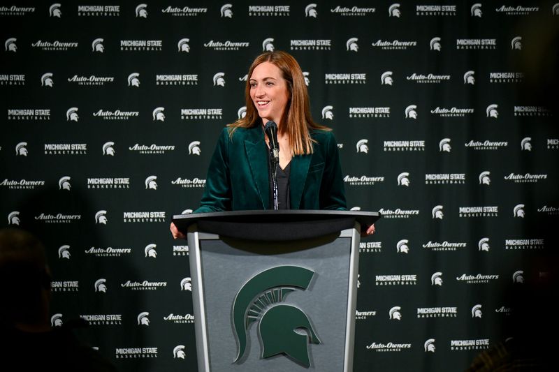 Michigan State's head coach Robyn Fralick smiles while speaking during women's basketball media day on Tuesday, Oct. 21, 2025, at the Breslin Center in East Lansing.
