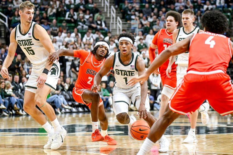 Michigan State's Jeremy Fears Jr., center moves the ball against Bowling Green during the first half on Thursday, Oct. 23, 2025, at the Breslin Center in East Lansing.