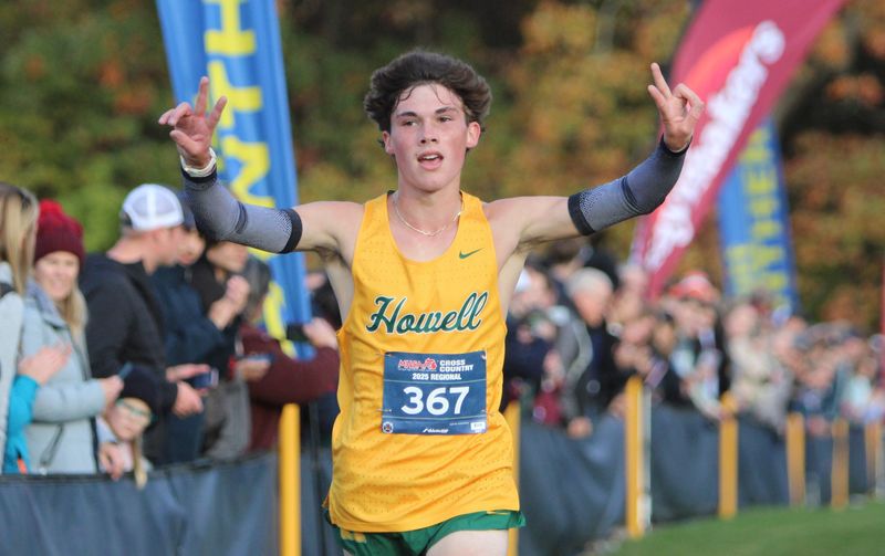 Jack MacGregor of Howell runs to his second individual championship at the Division 1 regional cross country meet on Friday, Oct. 24, 2025 at DeWitt High School.