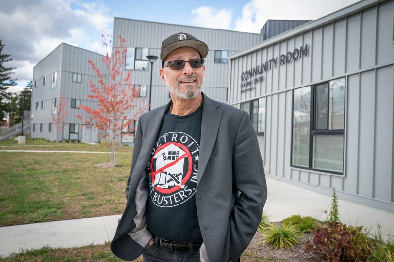 Blight Busters founder John George gives a tour of his projects in the Old Redford neighborhood on Friday, Oct. 24, 2025. George recently entered the business of multifamily housing development, and poses with the newly constructed 48-unit affordable housing community named Orchard Village.