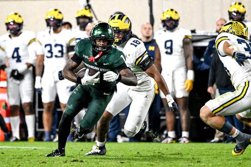 Michigan State's Omari Kelly runs after a catch against Michigan during the fourth quarter on Saturday, Oct. 25, 2025, at Spartan Stadium in East Lansing.