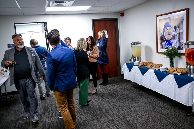 Guests tour the UM Health-Sparrow and East Lansing Public Schools Health Center on Thursday, Oct. 30, 2025, at the high school in East Lansing.