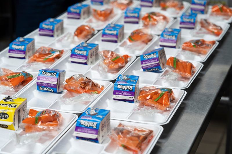 Trays are started for students before lunch at Wilcox Elementary School in Holt on Wednesday, Nov. 8, 2023. Students at the school are supplied with free lunches as part of the Michigan School Meals project, which makes breakfast and lunch free for all students in public schools.