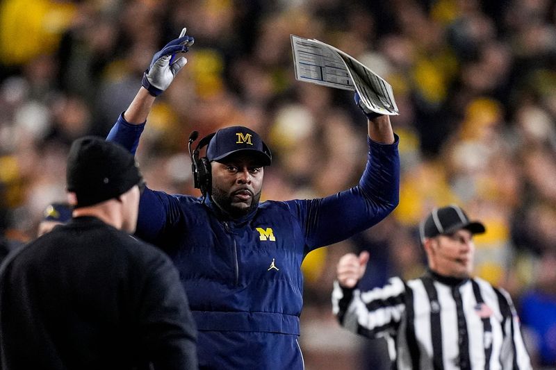 Michigan head coach Sherrone Moore reacts to a play against Purdue during the second half at Michigan Stadium in Ann Arbor on Saturday, November 1, 2025.
