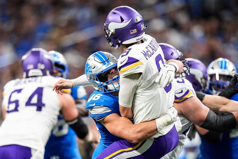 Detroit Lions linebacker Jack Campbell (46) is called roughing the passer for a tackle against Minnesota Vikings quarterback J.J. McCarthy (9) during the first half at Ford Field in Detroit on Sunday, November 2, 2025.