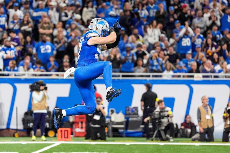 Detroit Lions defensive end Aidan Hutchinson (97) celebrates a sack against Minnesota Vikings quarterback J.J. McCarthy (9) during the second half at Ford Field in Detroit on Sunday, November 2, 2025.
