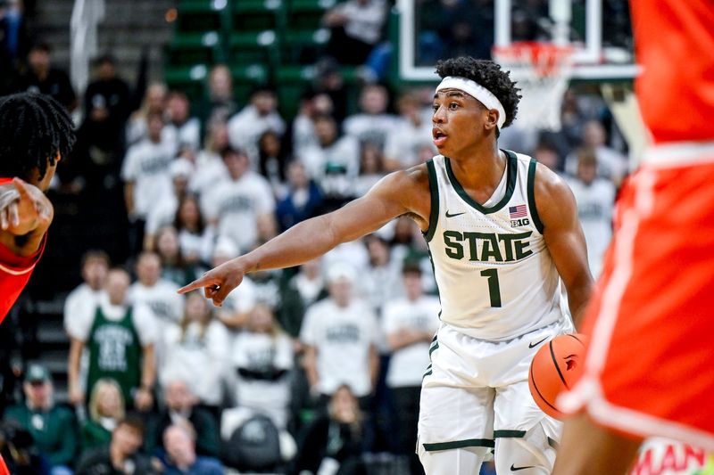 Michigan State's Jeremy Fears Jr. directs teammates against Bowling Green during the first half on Thursday, Oct. 23, 2025, at the Breslin Center in East Lansing.