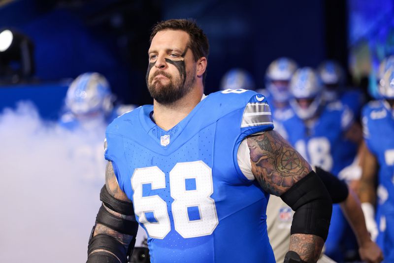 Nov 2, 2025; Detroit, Michigan, USA; Detroit Lions tackle Taylor Decker (68) enters the field before the game against the Minnesota Vikings at Ford Field.
